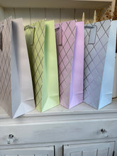 Load image into Gallery viewer, Patterned Foil Large Gift Bags – Pack of 4 Mixed Designs | Pretty Pound