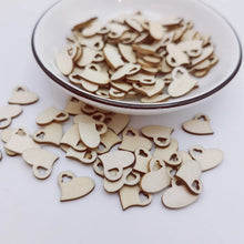 Load image into Gallery viewer, 100pcs 15mm Mini Wood Natural Hollow Love Heart Cutout Wooden DIY Arts Crafts Valentine&#39;s Day Wedding Table Confetti Decorations